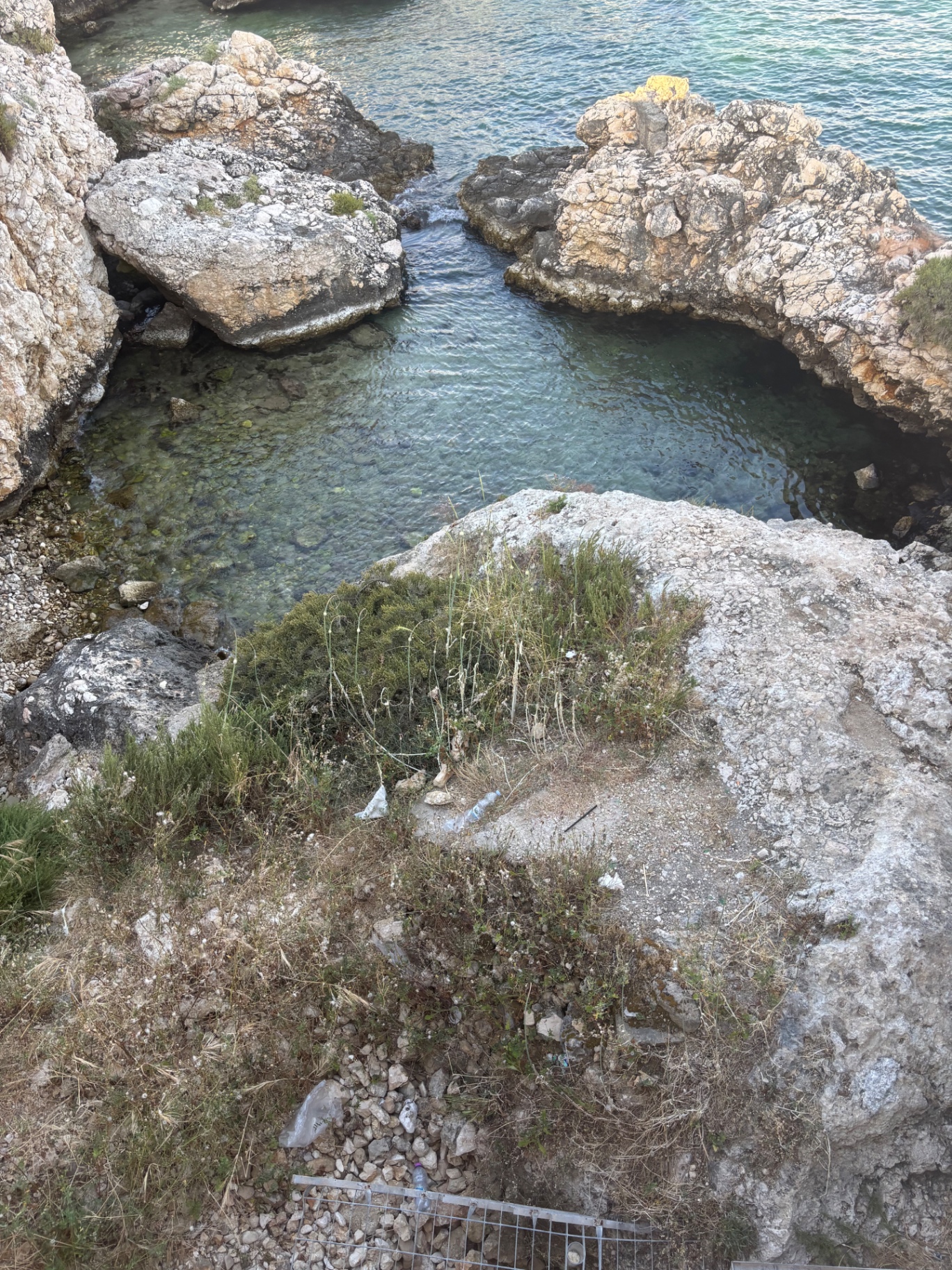 Water flowing between rocks, Puglia coastline