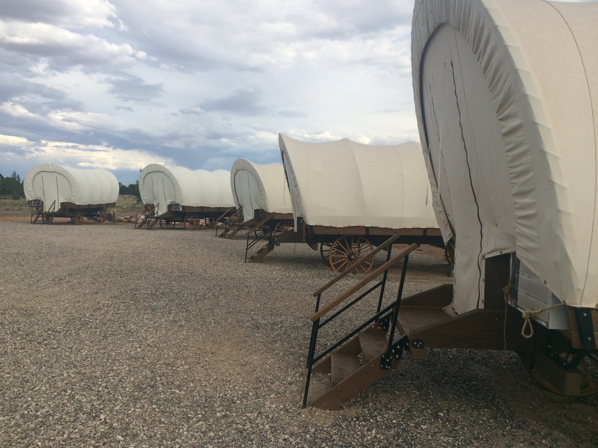 Row of covered wagons in the Utah desert at Torrey